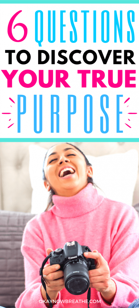 Female in pink sweater laughing and holding a digital camera. Text says 6 Questions to Discover Your True Purpose