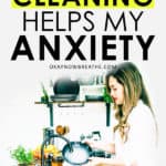 Woman doing the dishes with Why Cleaning Helps My Anxiety is written over it