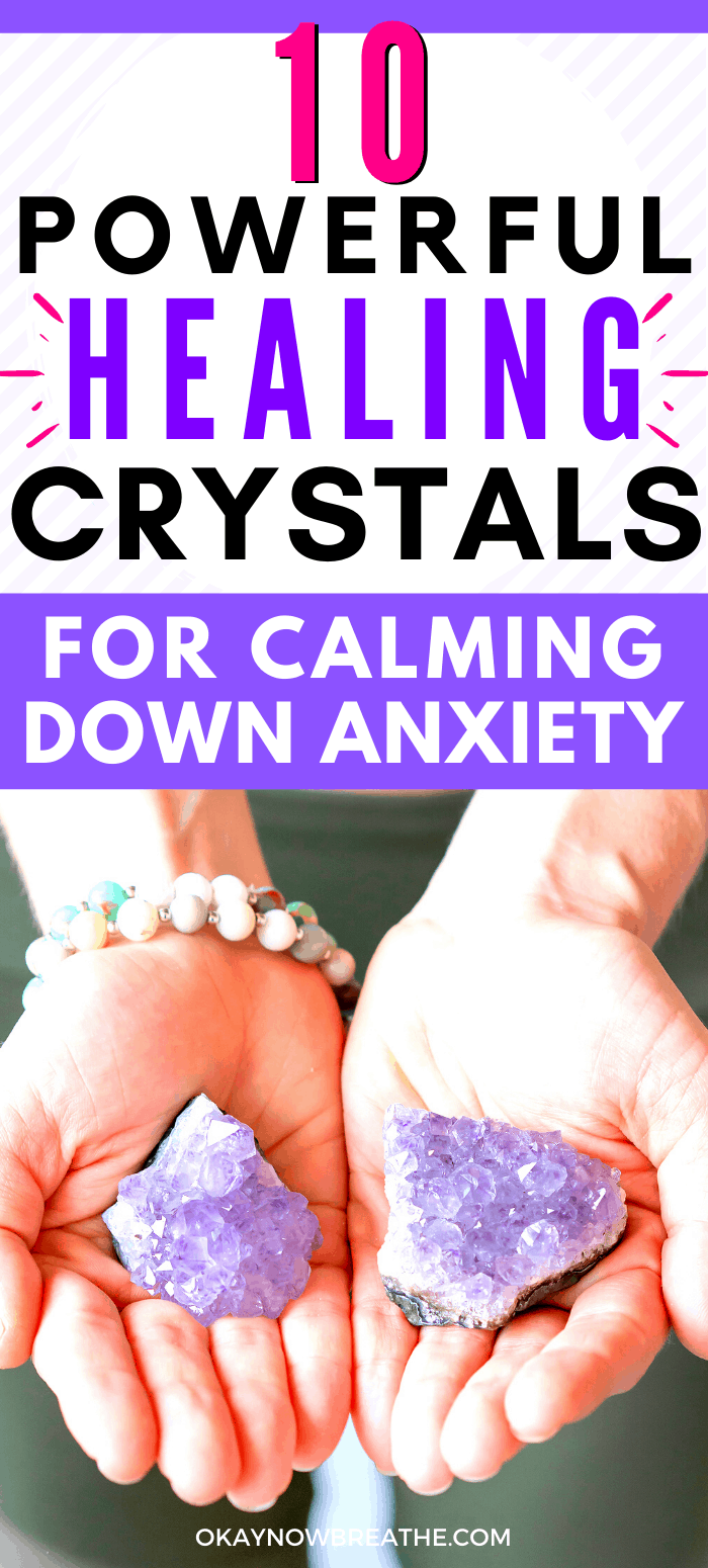 Text says 10 Powerful Healing Crystals for Calming Down Anxiety. Hands are carrying two amethyst cluster crystals