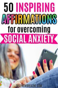 Female looking at her phone and smiling. Text says 50 Inspiring Affirmations for Overcoming Social Anxiety