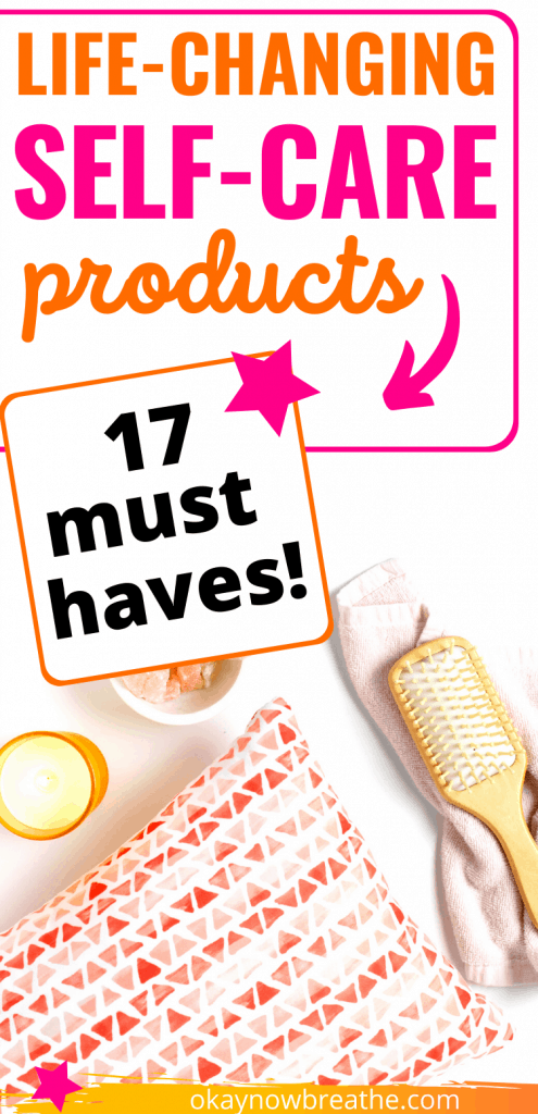 Orange and white bag next to hair brush and lit candle. Text says life-changing self-care products. 17 must haves!
