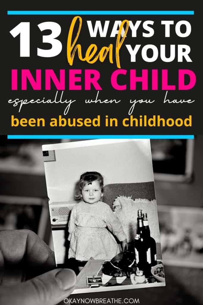 There is a hand holding a black and white photo of a toddler girl with alcohol bottles in it. Above the image, there is text that says 13 ways to heal your inner child especially when you have been abused in childhood - okaynowbreathe.com