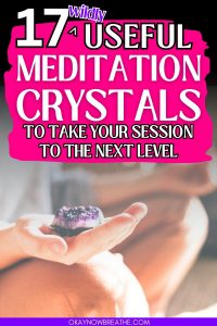 A person is holding an amethyst cluster crystal in the palm of their hand in meditation. Overtop, there is text that says: 17 wildly useful meditation crystals to take your session to the next level - okaynowbreathe.com