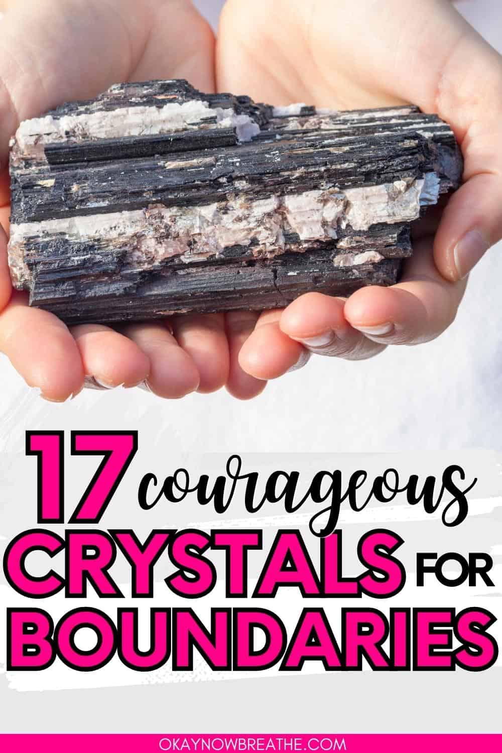 There are hands holding a large piece of black tourmaline. Below, there is text: 17 courageous crystals for boundaries.